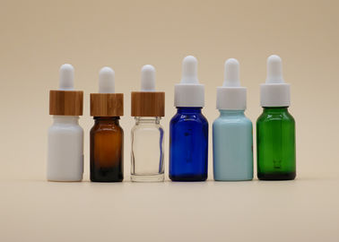 Bernsteinfarbige leere Flaschen-Farbbeschichtende weiße keramische Tropfflasche des ätherischen Öls