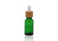 Grüne kosmetische Glastropfflaschen des Öl-18mm mit Bambustropfenzähler-Druckpipette